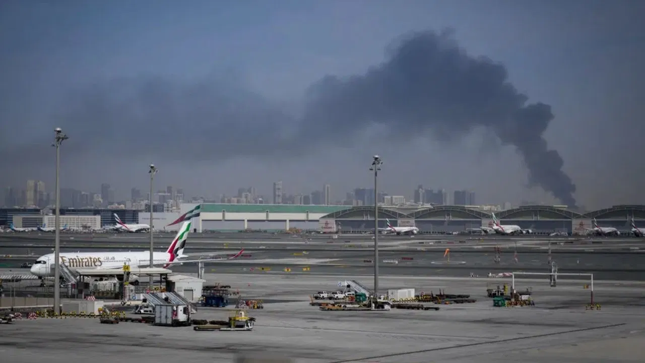 Smoke rising over busy airport
