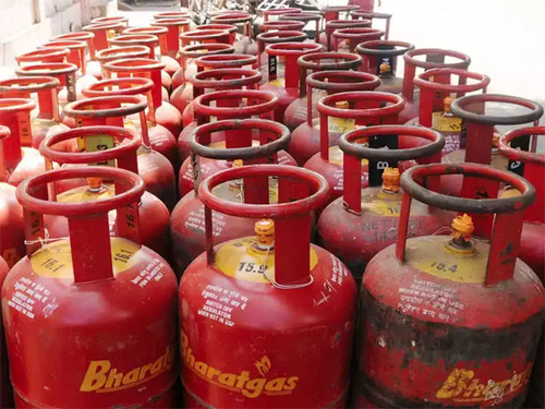 Rows of red gas cylinders stacked