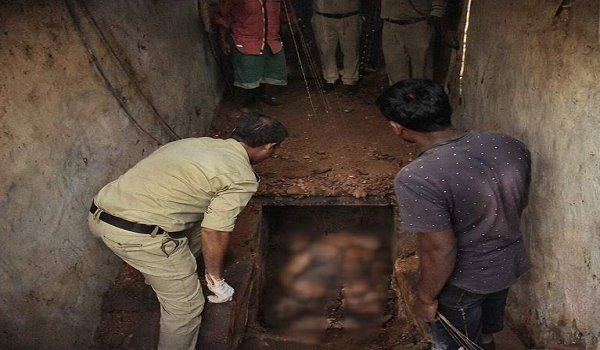 Police investigating a grave site