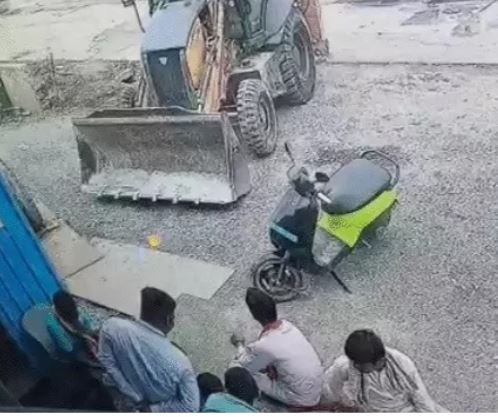 JCB tyre bursts while being inflated