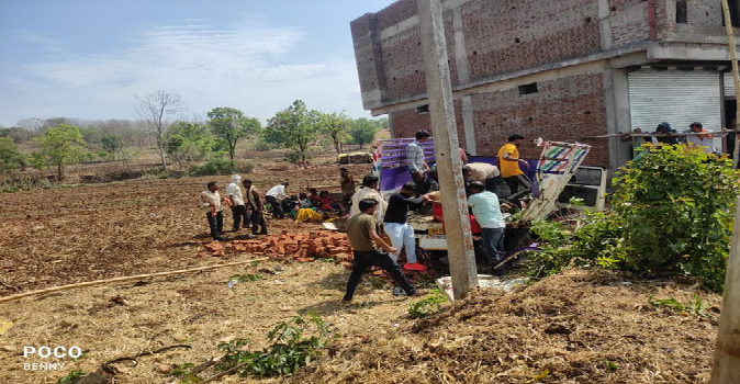 Major Accident: Pickup truck packed with laborers involved in collision; bodies strewn across the road, many injured.